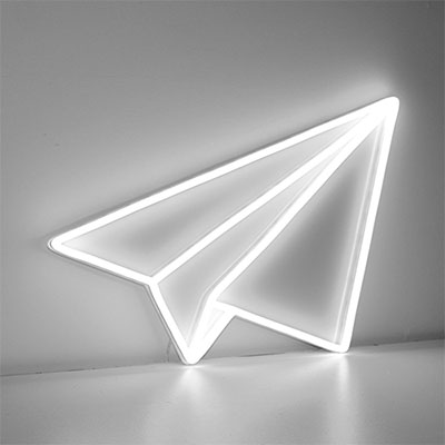 Paper plane neon sign